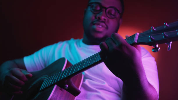 istock Music performer guitar concert man neon light 2178274354