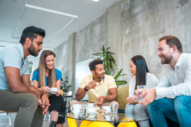 istock Stylish Workmates Enjoying Coffee Together 2178275094