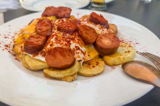 istock Morcilla patatera served over fried eggs and potatoes 2178277218