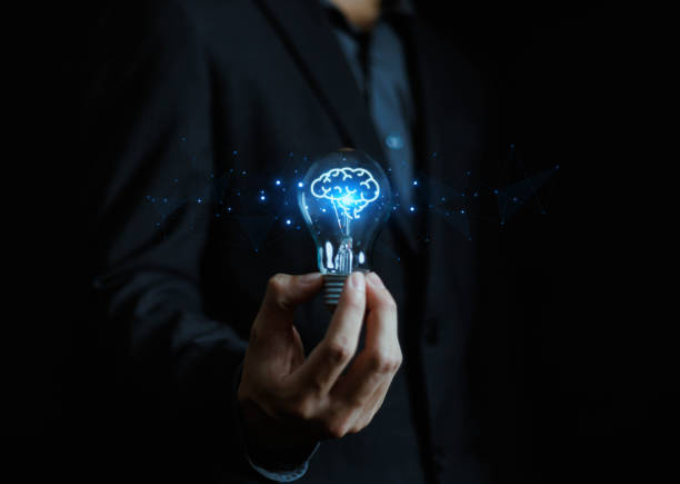 istock Innovation and inspiration concept. Businessman holding creative light bulb with industry and marketing development network icons. Strategic planning. Modern business and inspiration Idea innovation 2178285000