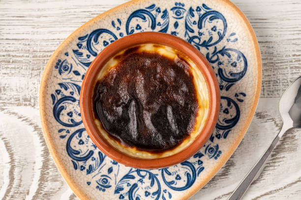 istock Traditional turkish dessert bakery rice pudding Turkish name Firin Sutlac in ceramic bowl 2178293377