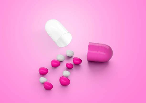 istock An Open Pink And White Glossy Capsule With Minimal Heart Shaped Pills Spilling Out 3D Illustration 2178294179