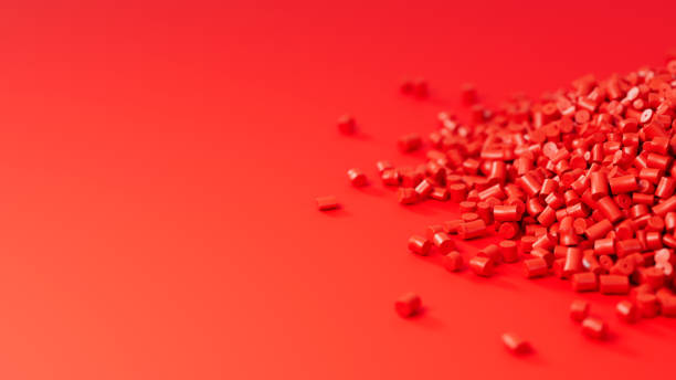 istock Closeup side view on red plastic polypropylene granules heap on red backdrop with shallow DOF, masterbatch polymer grain pile. HDPE or PVC resin pellets. 3d render illustration 2178297277