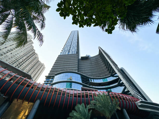 istock A dramatic upward view of a modern skyscraper with a unique architectural design 2178298219