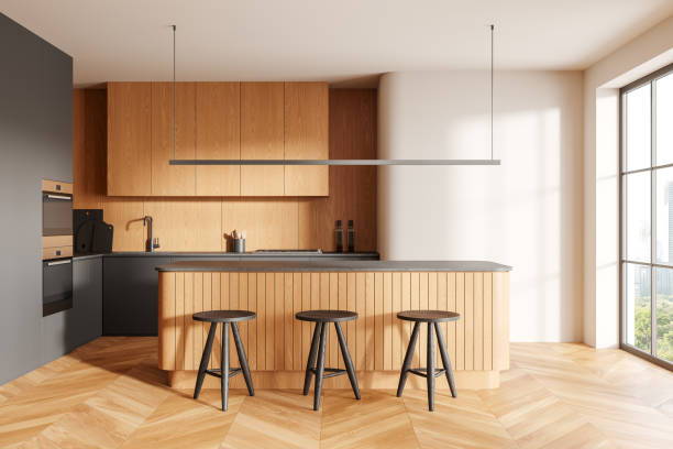 istock Wooden home kitchen interior with cooking cabinet and island, panoramic window 2178300638