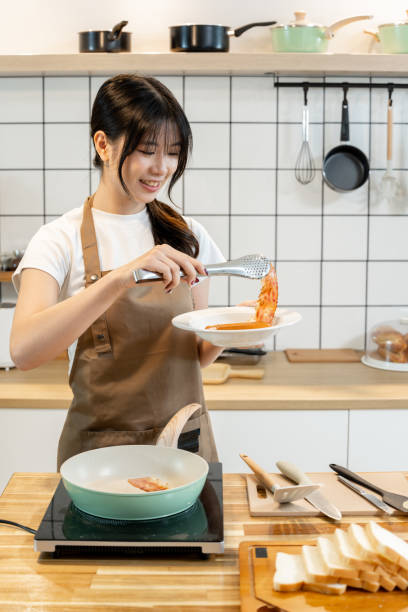 istock An Asian woman is making breakfast content for her followers. 2178301329