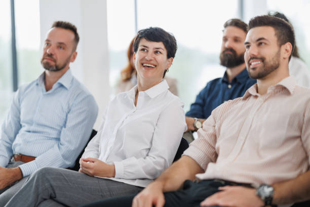 istock Celebrating Success at a Business Conference 2178301474