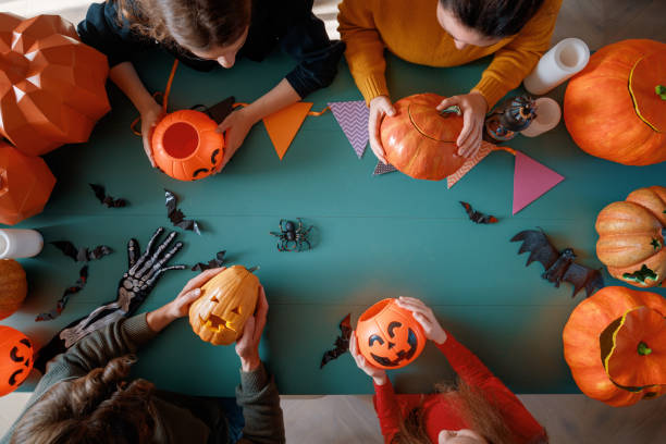 istock Happy family preparing for Halloween. 2178301738