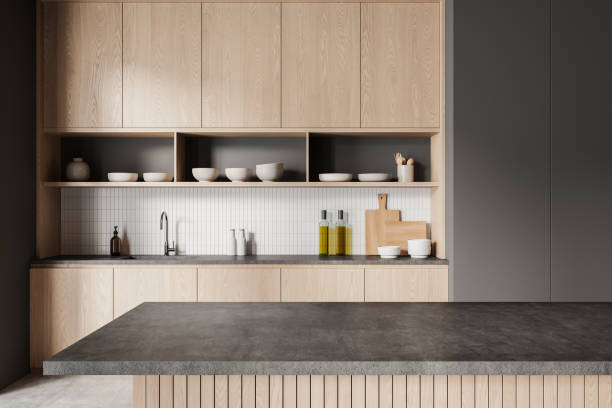 istock Cozy home kitchen interior with cooking cabinet, bar island and kitchenware 2178302131