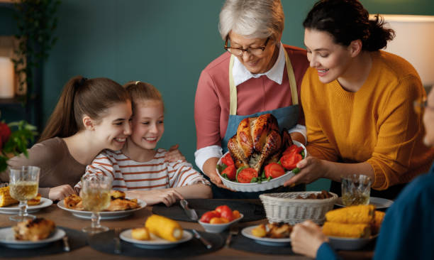 istock Family celebrating Thanksgiving Day 2178302381