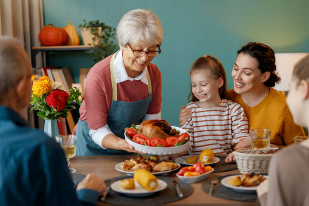 istock Family celebrating Thanksgiving Day 2178302395