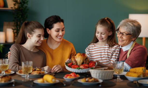 istock Family celebrating Thanksgiving Day 2178302428