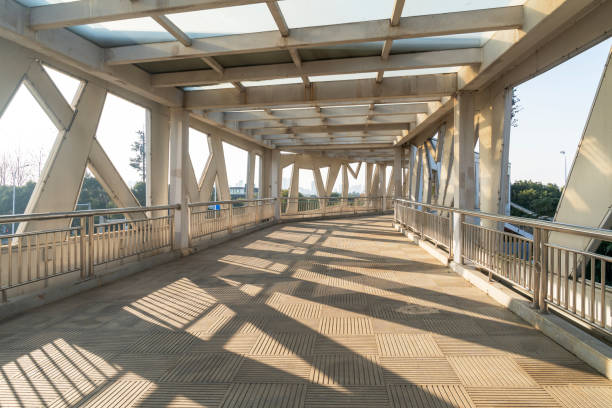 istock Inside of a modern overhead pedestrian bridge 2178302601