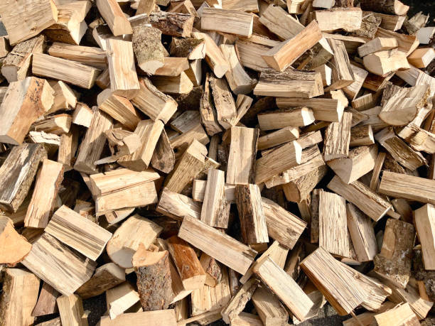 istock Wood firewood backdrop for fireplace and stove 2178303924