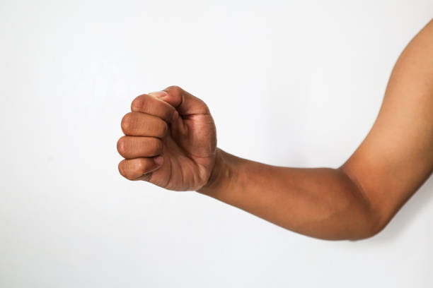 istock strong fists clenched wanting to punch 2178305566