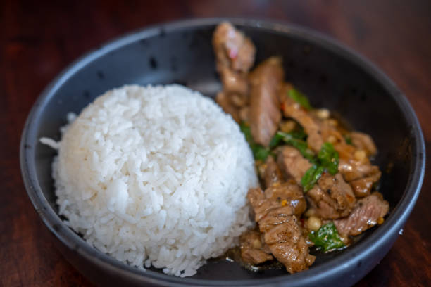 istock Rice with Kaprao beef served on plate. It is Thai style stir-fried holy basil with meat. 2178305924
