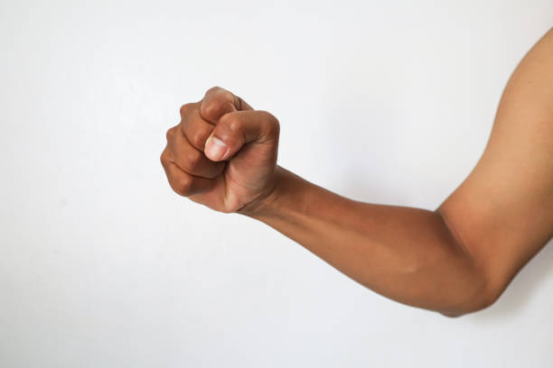istock strong fists clenched wanting to punch 2178305999