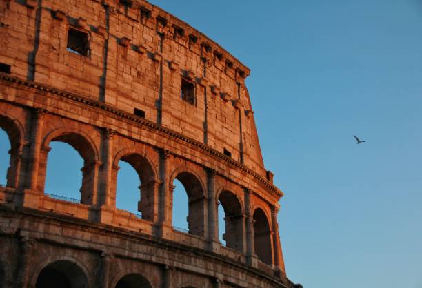 istock Wall of the Colosseum at sunset 2178308770