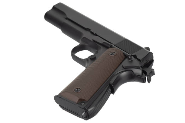 M1911 Automatic Pistol, Caliber .45 M1911 Automatic Pistol, Caliber .45 isolated on white background forty five caliber handgun stock pictures, royalty-free photos & images
