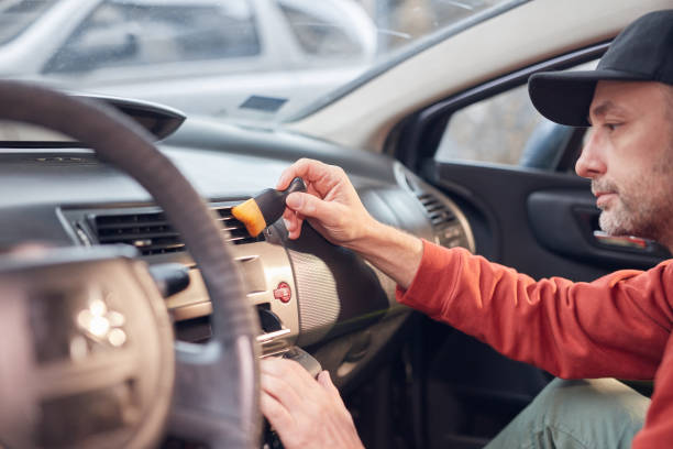 istock Cleaning ordinary dusty car interior and ventilation. 2178329162