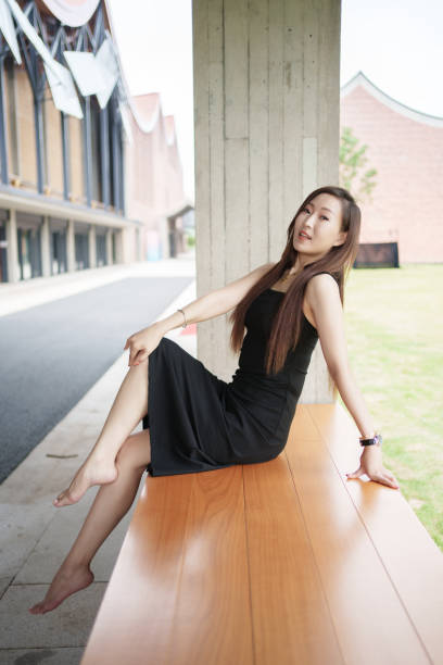 Asian woman sitting in the rest area