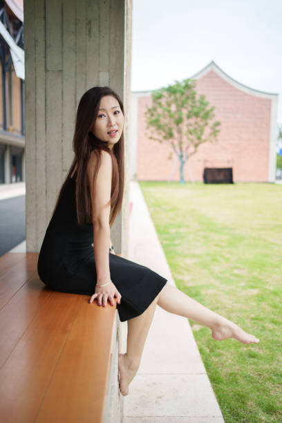Asian woman sitting in the rest area