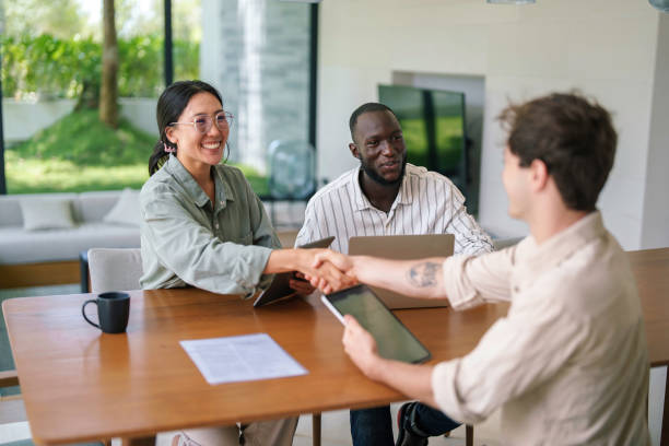 istock Diverse Team of Young Business Professionals in Brainstorming Session 2178334819