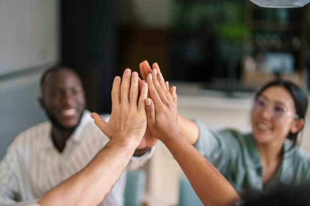 istock Diverse Business Team Celebrates Success with High Five 2178334918