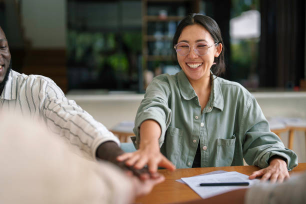 istock Diverse Team Celebrates Success in Modern Office 2178334924