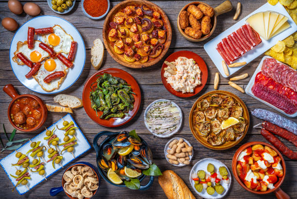 istock Assorted Tapas from Spain food, typical Spanish recipes, and pintxos on a rustic wood 2178335065