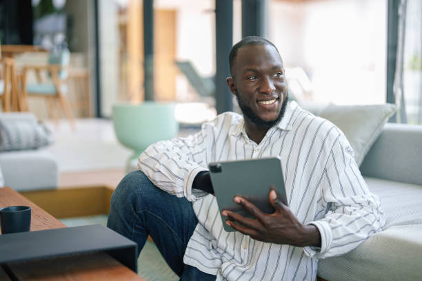 istock Professional Black Businessman with Tablet in Office 2178335212