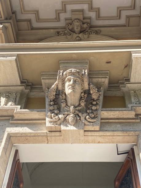 istock Allegorical sculptural head  above doorway. 2178336763