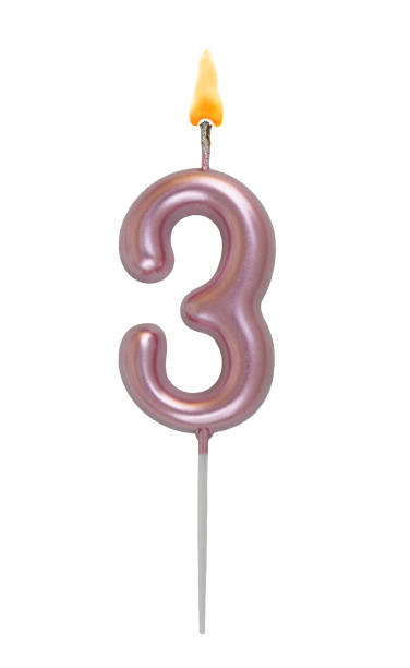 istock Pink birthday candle isolated on white background, number 3 2178338516
