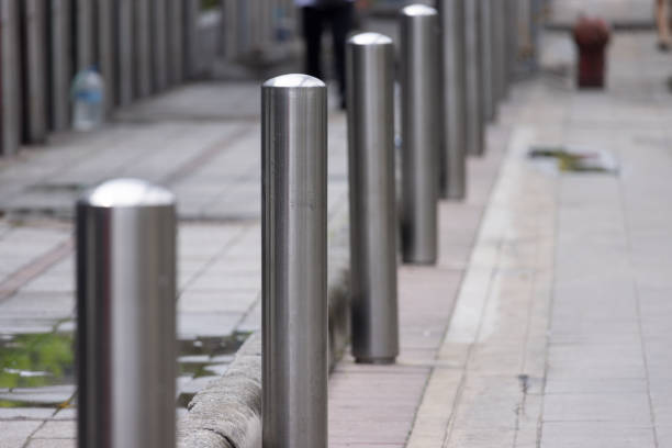 istock A row of metal poles on a sidewalk 2178339986