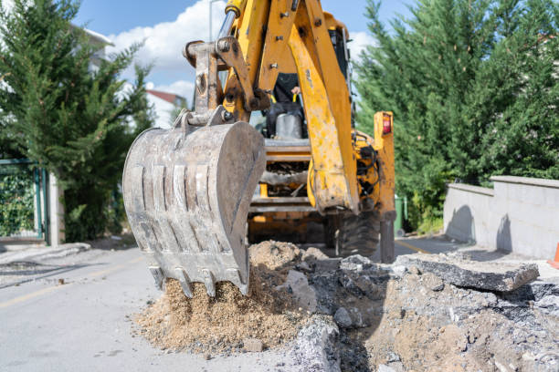 istock Excavator Digging Asphalt On The City Street 2178341498