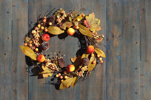 istock Autumn wreath with leaves and apples. 2178343643