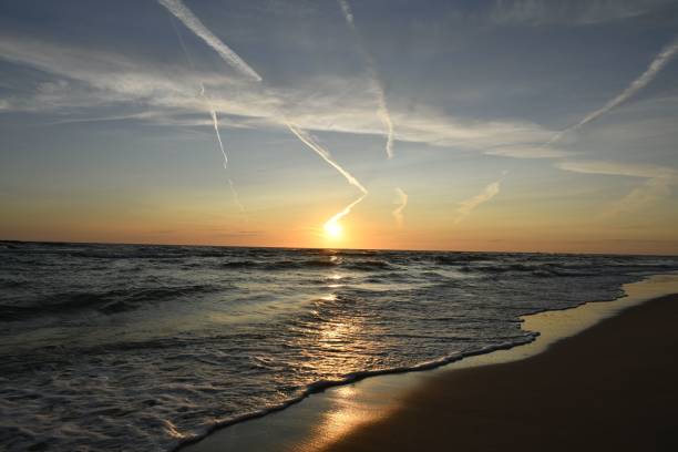 istock Serene ocean sunset with gentle waves. 2178344681