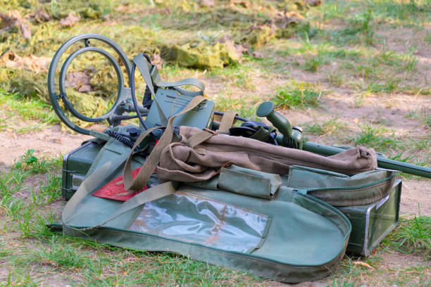 istock Military-style metal detector, case and other mine-hunting tools. 2178347393