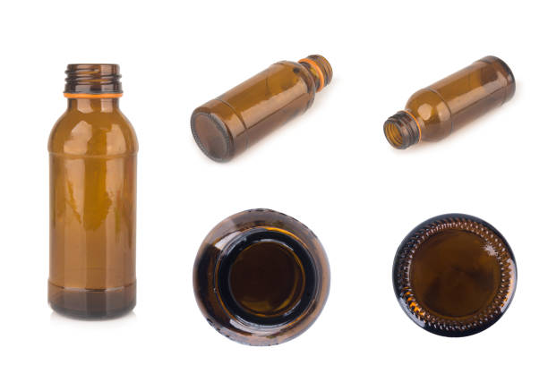 Glass bottle, Energy drink isolated on white background brown.