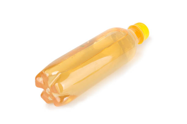 Orange Juice in Recycled PET Plastic Bottle on Blue Background