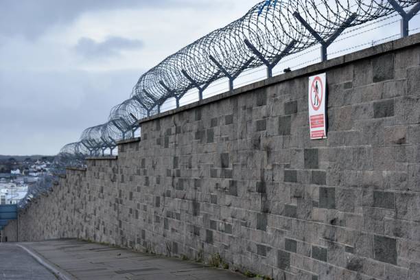 Security wall around the nuclear base at Plymouth, UK