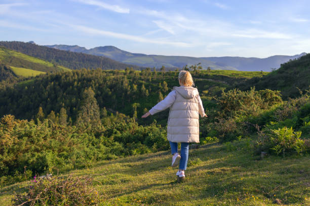 istock Mature  woman walks in nature 2178349852