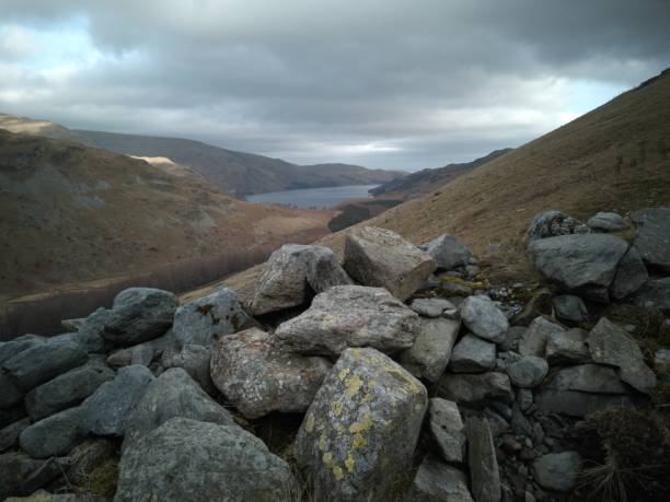 Cumbrian walling above a lake in the lake district, England