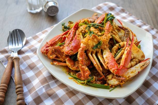 istock Fried crab in yellow curry, stir-fried crab curry in white plate 2178350085