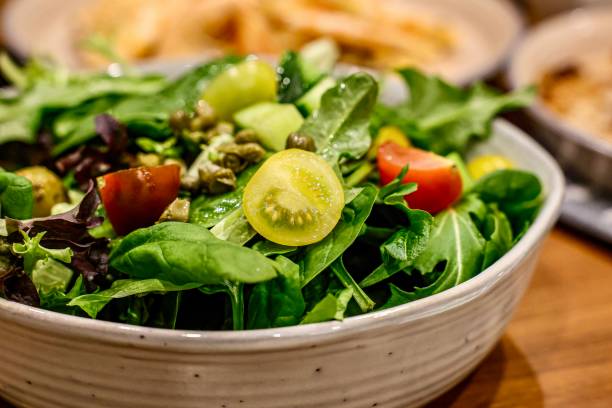 Fresh garden salad with mixed greens and tomatoes