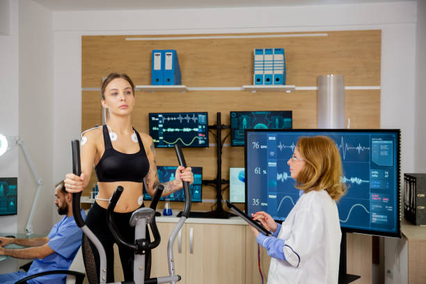 istock Female patient giving physical activity tests in the lab while a doctor supervises her 2178351577