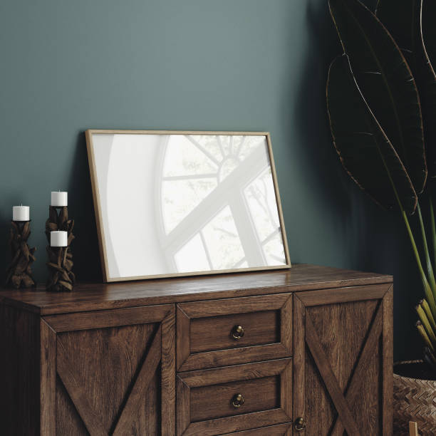istock Mock-up frame standing on commode in dark green home interior close up 2178352607