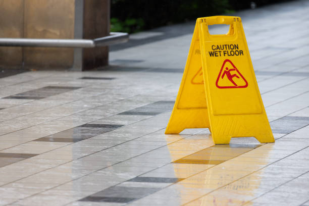 istock A yellow caution sign is on the ground 2178352672