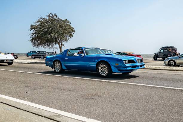 Gulfport, MS - October 04, 2023: Wide angle  front corner view of a 1977 Pontiac Firebird Trans Am Coupe at a local car show.