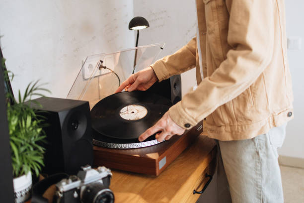 istock Unrecognizable Man Placing a Vinyl Album on the Player 2178358520